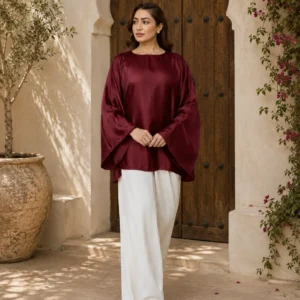 Women wearing maroon satin kaftan top